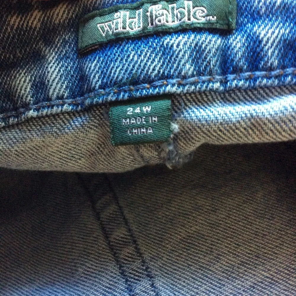 Wild fable, raw ham acid wash denim mini skirt. 24W.